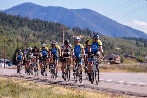 Our lawyers and staff biking on a road